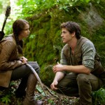 Katniss Everdeen (Jennifer Lawrence) and Gale Hawthorne (Liam Hemsworth) in THE HUNGER GAMES. Photo credit: Murray Close